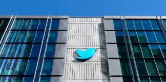Twitter bird logo on a modern office building facade