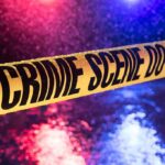 Aid Gridlock: Texas Counties Twist crime scene tape with police lights in rain