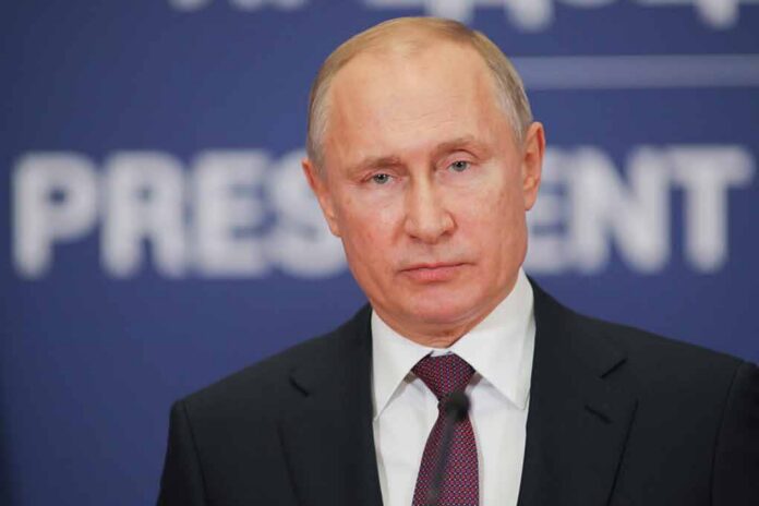 Vladimir Putin at a podium with microphone