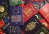 Finland Pushes EU Travel Lockdown Assorted international passports spread out on a surface
