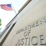 Department of Justice building with American flag