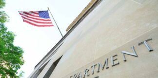 Department of Justice building with American flag