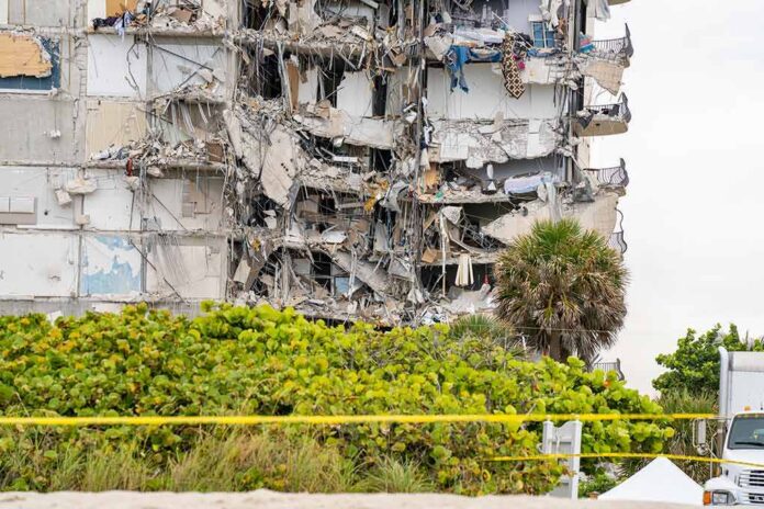 Partially collapsed apartment building with exposed interiors