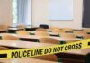 Teen Gunfire Shocks France Empty classroom with police tape across desks